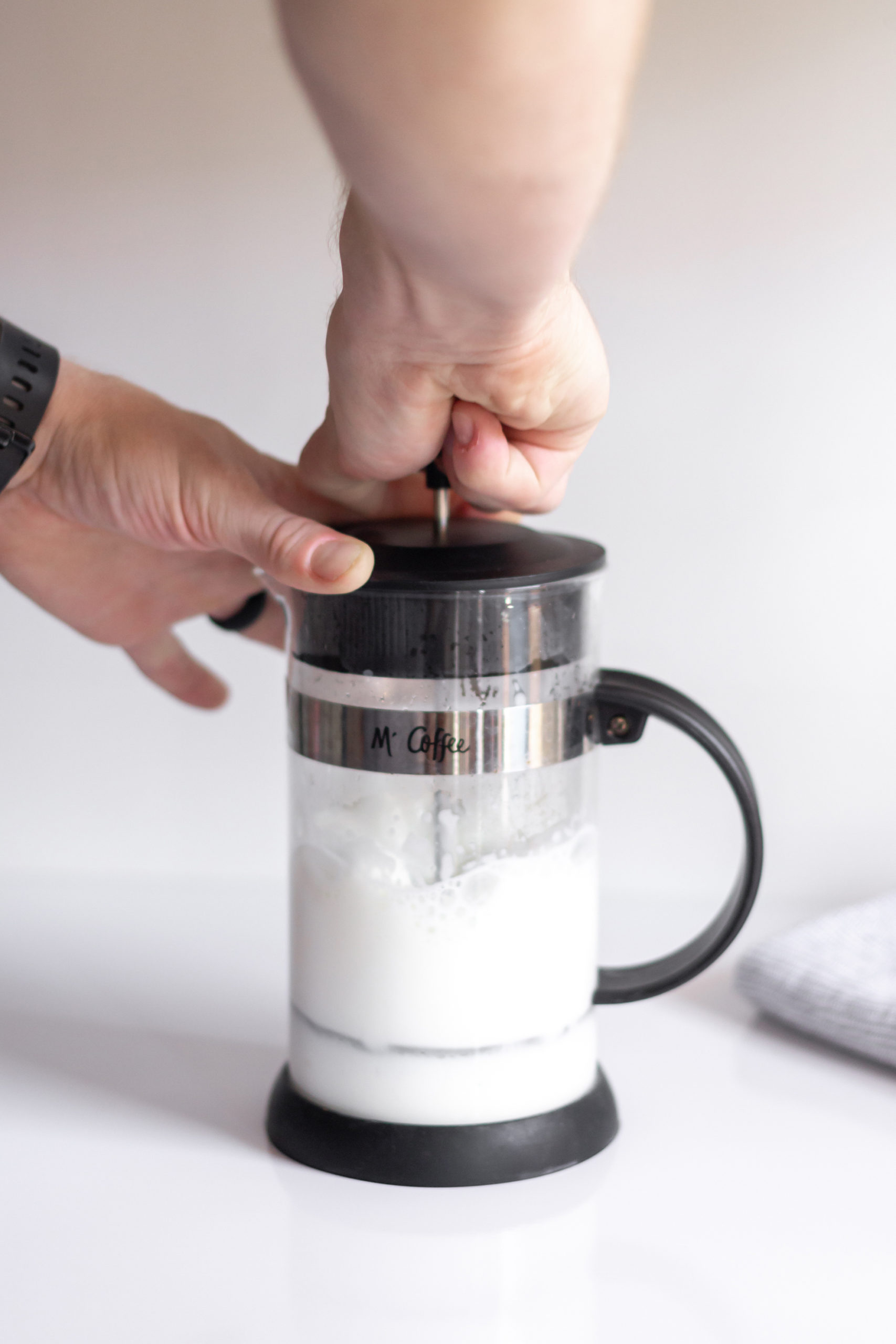 How to Froth Milk at Home using a French Press - Yes Moore Tea
